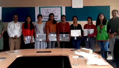 Laptop donation at Persistent Foundation